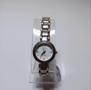 Vintage peugeot ladies watch quartz two tone  with new battery shows signs of we